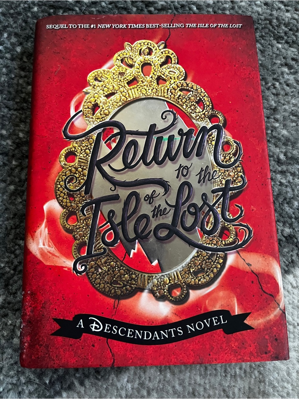 Return to the Isle of the Lost - Red Decorative Coffee Table Book